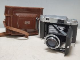 An Ensign Autorange 820 Rangefinder Camera with Ross Xpres f/3.8 105mm lens in original case