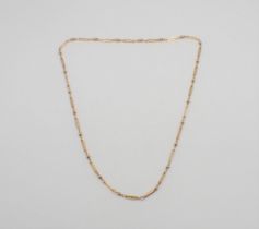 A fancy link Chain marked 9ct, 47cms long, approx 5.90gms