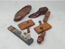A 19th Century novelty treen Snuff Box in the form of a Shoe with carved bow and inlaid brass