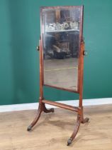 A 19th Century mahogany Cheval Robing Mirror with bevelled plate, on splayed fluted supports,