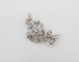 A Diamond flower spray Brooch claw and pavé-set brilliant-cut stones throughout in 9ct white gold,