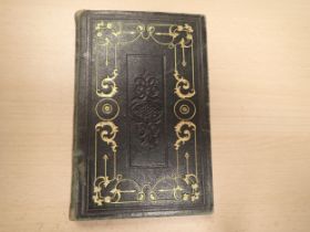 An embossed and gilt tooled leather bound Scrap Album, presented to Eugene, Frederick Noel by his