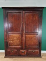 A large antique oak Cupboard with a pair of panelled doors and with three drawers to the base, 6ft