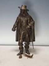 A bronze Statue of a Musketeer, said to be by 'Gustave Dore' (Paris), missing its plinth base,