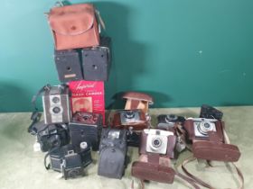 A quantity of Box Cameras and folding Cameras, including a Houghton Folding Camera, an Ilford