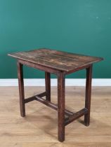 An antique oak Side Table the three plank top raised on chamfered supports united by H stretcher,