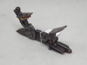 A detached Flintlock Mechanism from a British Military Holster Pistol, in working order,
