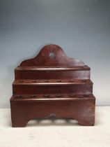 An 18th Century oak Spoon Rack with Cupid's Bow apron 1ft 3in W x 1ft 2in H