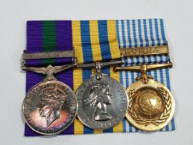 Three; General Service Medal with 'Palestine 1945-48' Clasp, Queen's Korea Medal and UN Korea