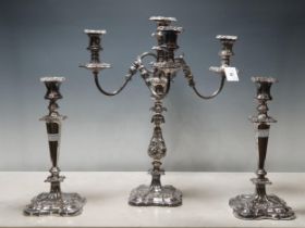 A plated Candelabra with floral decorated bulbous column on shaped square base, the surmount with