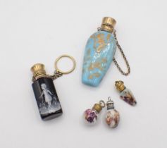 Three miniature Scent Bottles, a glass Scent Bottle with Mary Gregory style decoration and a