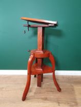 A late 19th Century mahogany Studio Camera stand, a rise, fall and tilting mechanism on shaped