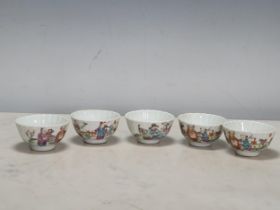 A set of five Chinese Tea Bowls of lobed design, decorated figures in a landscape, 2 3/4in diam