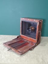 A mahogany and brass mounted, 12 x 10in, large format Camera with Busch lens