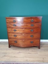 A large 19th Century mahogany bowfront Chest of two short and four long graduated drawers on splay