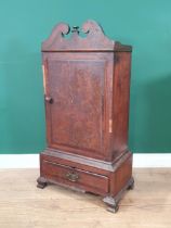 An early 18th century oak Table Top Spice Cupboard, the broken pediment top above a single door