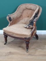 A 19th Century Holland & Sons Armchair with turned front supports and casters, stamped to the back