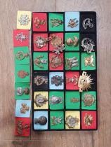 A collection of 34 Military Badges, to include Yeomanry and Lancers, etc.