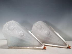 A pair of Art Deco Wall Lights, with moulded frosted glass shades with shaped tops and raised floral