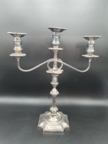 A George V silver Candlestick having knop stem on square base with inverted corners engraved