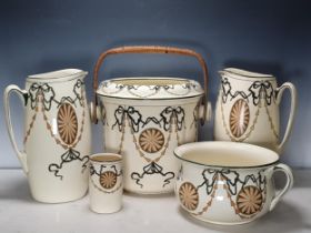 A Royal Doulton Toilet Set, with medallions and ribbon designs, including a Pail and Cover with cane