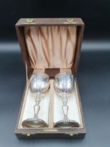 A pair of Elizabeth II silver Limited Edition Silver Wedding Goblets on baluster columns decorated