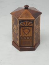 A treen Money Box in the form of a hexagonal House with simulated windows and door, with twist off