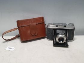 An Agfa Super Isolette Rangefinder Camera with Agfa Solinar 3.5/75 lens in outer case