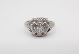 A mid 20th Century Diamond three stone Ring the pierced mount rubover-set graduated marquise-cut