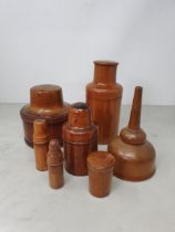 Two treen Bottle Cases containing Apothecary Bottles and Stoppers, the largest 7½in High, a large