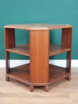 A walnut "Heal & Son London" octagonal two tier Book Table raised on octagonal bun feet, with