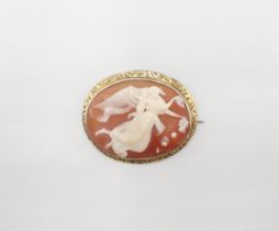 A carved shell Cameo Brooch depicting the goddess Flora in engraved frame, 50mm x 42mm