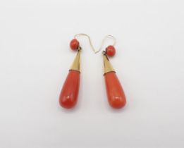 A pair of Coral Ear Pendants each with bouton coral suspending conical mount set drop shaped