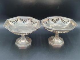 A pair of George V silver octagonal Tazzas with pierced friezes on pedestal bases, Birmingham