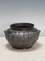 A Chinese bronze Bowl with two Kylin masks, 7 1/2in diam