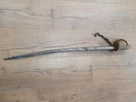 A Victorian British Naval Officer's Sword with etched pipe back blade in rusted and pitted condition