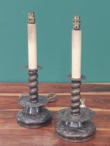 A pair of brass Table Lamps with wide drip pans, embossed floral and fluted decoration, 18in high