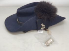 A pre-war Sudan Police Officers Parade Slouch Hat, with ostrich feather cockade and original