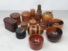 A collection of treen items including a carved fruitwood Apple with gilt metal leaf and stalk,
