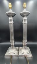 A large pair of plated Table Lamps with fluted columns on square bases, 23in, fitted electricity