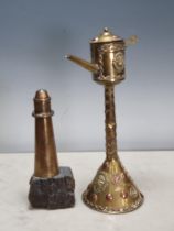 A brass model of a Lighthouse mounted on a piece of stone, 6 1/4in H, and a Whale Oil Lamp