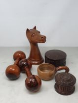 A collection of treen including a pair of turned lignum vitae Dumbbells, a circular treen lidded Box