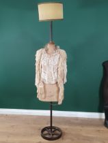 An antique ladies Dressmaker's Mannequin converted into a standard lamp with shade, marked Buste