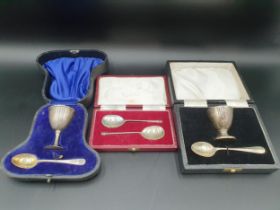 A pair of Elizabeth II silver seal top Spoons, Sheffield 1973, and two Egg Cups and Spoons,