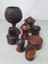 A collection of treen including a ribbed Barrel enclosing Inkwell, four assorted turned treen