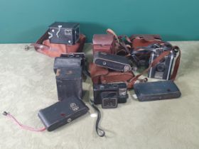A quantity of various Cameras including a Mastra V35, Box Cameras, folding Cameras, instant Cameras,