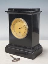 A William IV black marble Timepiece, having guilloche dial, engraved back plate, J.McCabe, London