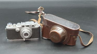 A Leica IIIc Camera No 498705, in original leather case