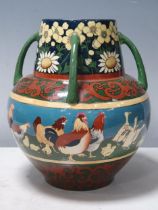 A Frederick Rhead for De Foley "Intarsio" four handled globular Vase, decorated with Chickens and