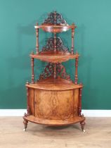 A Victorian walnut three tier Corner Whatnot with inlaid decoration, fitted bow fronted door to